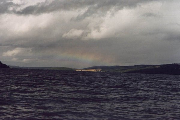 a non-clickable picture of a rainbow over Loch Ness